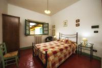 A bed or beds in a room at Il Chicco d'Oro