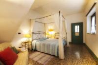 A bed or beds in a room at Il Chicco d'Oro