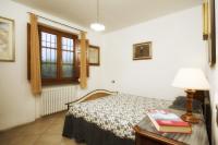 A bed or beds in a room at Il Chicco d'Oro