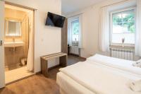 Posteľ alebo postele v izbe v ubytovaní AMADEA - Cityhotel Salzburg