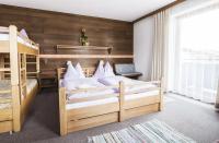 Posteľ alebo postele v izbe v ubytovaní Naturpension Mühlhof