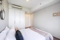Postel nebo postele na pokoji v ubytování Amazingly UNIXX 2 Bedroom Condo in Pattaya