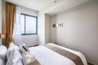 Postel nebo postele na pokoji v ubytování Amazingly UNIXX 2 Bedroom Condo in Pattaya