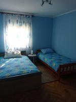 Posteľ alebo postele v izbe v ubytovaní Apartman 4