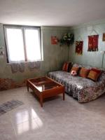 A seating area at TITI' appartamento vacanze La Corte
