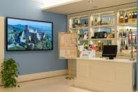 Telewizja i/lub zestaw kina domowego w obiekcie Hotel Roxy Plaza