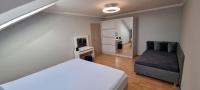 Łóżko lub łóżka w pokoju w obiekcie Apartmán Viktorie