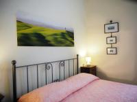 Łóżko lub łóżka w pokoju w obiekcie Palazzo Bianchi Bandinelli by FrancigenaApartments