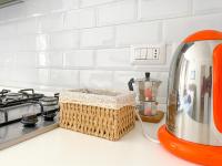 A kitchen or kitchenette at Le Casette di Piazza Borsa