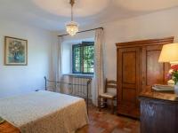 Łóżko lub łóżka w pokoju w obiekcie Holiday Home La Badia by Interhome