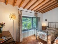 Łóżko lub łóżka w pokoju w obiekcie Holiday Home La Badia by Interhome