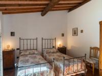 Łóżko lub łóżka w pokoju w obiekcie Holiday Home La Badia by Interhome