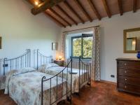 Łóżko lub łóżka w pokoju w obiekcie Holiday Home La Badia by Interhome
