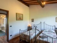 Łóżko lub łóżka w pokoju w obiekcie Holiday Home La Badia by Interhome