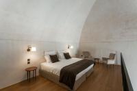 Posteľ alebo postele v izbe v ubytovaní Palazzo Tafuri Boutique Hotel