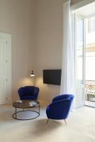 Televízia a/alebo spoločenská miestnosť v ubytovaní Palazzo Tafuri Boutique Hotel