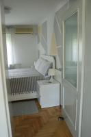 Posteľ alebo postele v izbe v ubytovaní Apartment Elize