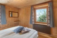 Posteľ alebo postele v izbe v ubytovaní Appartamento Nonna Engadina Chalet