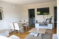 Televízia a/alebo spoločenská miestnosť v ubytovaní Apartment Elize