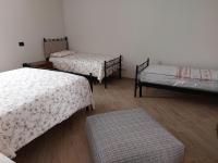 Posteľ alebo postele v izbe v ubytovaní Il Poggio degli Antichi Sapori - Residence