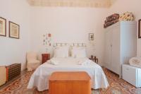 Posteľ alebo postele v izbe v ubytovaní B&B Il Melograno Taranto