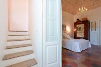 Posteľ alebo postele v izbe v ubytovaní B&B Il Melograno Taranto