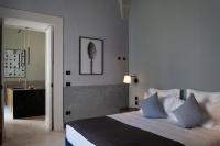 Posteľ alebo postele v izbe v ubytovaní Palazzo Tafuri Boutique Hotel