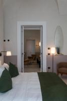 Posteľ alebo postele v izbe v ubytovaní Palazzo Tafuri Boutique Hotel