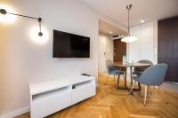 Telewizja i/lub zestaw kina domowego w obiekcie Powiśle Chic Apartment