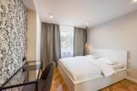 Łóżko lub łóżka w pokoju w obiekcie Powiśle Chic Apartment