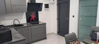 Kuchyňa alebo kuchynka v ubytovaní Apartman Julija 2