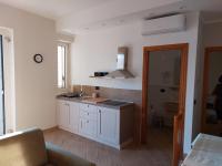Kuchyňa alebo kuchynka v ubytovaní Il Poggio degli Antichi Sapori - Residence