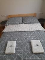 Posteľ alebo postele v izbe v ubytovaní Domek na Kępie