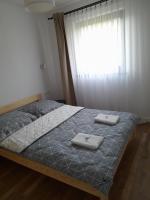Posteľ alebo postele v izbe v ubytovaní Domek na Kępie