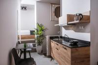 A kitchen or kitchenette at Jacuzzi suite Piazza dei Leoni