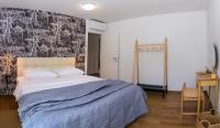 Posteľ alebo postele v izbe v ubytovaní Rivus Apartments
