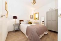 Postel nebo postele na pokoji v ubytování Room Boutique Calma Nerea By KubiK