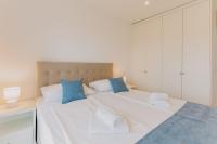 Posteľ alebo postele v izbe v ubytovaní Carmen Residence Apartments