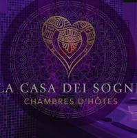 a purple sign with a heart and the words casa del sol chinese phones at La Casa dei Sogni in Flayosc