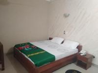 Bois vert Hôtelにあるベッド