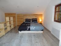 Łóżko lub łóżka w pokoju w obiekcie Chalet Le Tyrolien, au coeur du Boréon