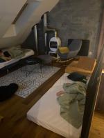 A bed or beds in a room at Superb Mýto Apartment