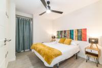 Posteľ alebo postele v izbe v ubytovaní Moderno apartamento Centro Granada