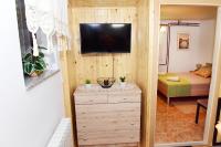 TV a/nebo společenská místnost v ubytování Apartman Bingo