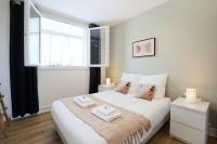 Posteľ alebo postele v izbe v ubytovaní expat renting - Le Bohème Zen - Proche Airbus