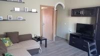 TV a/nebo společenská místnost v ubytování Apartamento, dos dormitorios, tipo ático cerca del centro