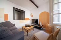 Telewizja i/lub zestaw kina domowego w obiekcie LES ARCHES - BELLE DECORATION - WIFI - AC CLiM