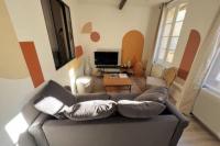 Telewizja i/lub zestaw kina domowego w obiekcie LES ARCHES - BELLE DECORATION - WIFI - AC CLiM