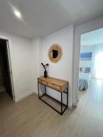 Postel nebo postele na pokoji v ubytování Apartamentos Buganvilla Roquetas de Mar