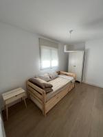 Postel nebo postele na pokoji v ubytování Apartamentos Buganvilla Roquetas de Mar